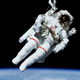 Illustration for article titled Scientists are working on a "tractor beam" that could recover astronauts floating in space